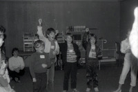 Children performing identical gestures thumbnail