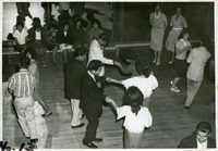 Group of teenage boys and girls dancing thumbnail