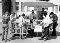 Jack Douglas working at the mobile book stand. thumbnail