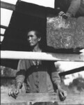 Woman in unfinished shack thumbnail