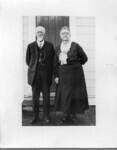 Sarah Locke Smith and husband William Thomas Smith in front of doorway. thumbnail