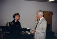J. Handel Evans Swearing in a Campus Police Officer thumbnail
