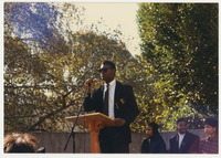 [Black speaker at a podium in University Union plaza] thumbnail