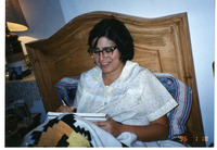 Michele Serros taking notes in bed thumbnail