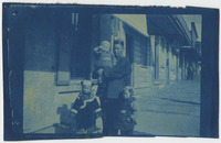 Man and Children Standing in front of Ah Louis Store thumbnail