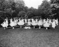 Young ballerinas performing outdoors. thumbnail
