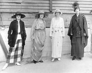 Four costumed women. thumbnail