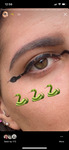 Valerie DiNigris COVID-19 Social Media Post of Snake Design Eye Makeup thumbnail
