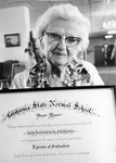 Bessie Wyman with diploma. thumbnail