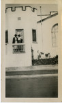 Two African American women on balcony of house. thumbnail