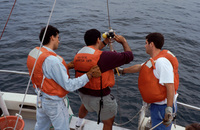 Paul, Garen and Paul setting up a water bottle on the oceanography cruise on Seaworld thumbnail