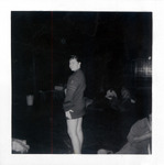 Teenage girl posing in a military type coat thumbnail