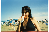 Michele eating pizza thumbnail