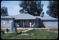 Glenna and boys at new home thumbnail