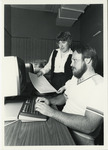 [Computer Engineering students and professor at work] thumbnail