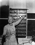 Woman handing out keys thumbnail