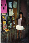 Michele Serros standing outside of a bookstore thumbnail