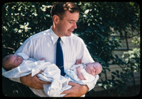 Bob with newborn twins thumbnail