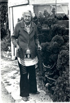 Grandma Prisbrey Holding Springs Outside of Pencil House thumbnail