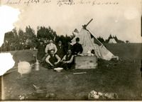 Displaced victims of the earthquake in front of a temporary tent shelter thumbnail