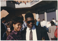 [Two Black students in University Union plaza crowd] thumbnail