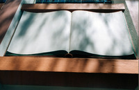 Close up of book design above old library entrance. thumbnail
