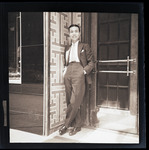 [Unidentified man at shop entrance] thumbnail