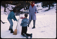 Cousins build a snowman thumbnail