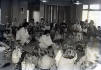 Martial artists speaking to children and adults thumbnail