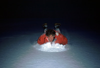 ChrisGotshalk storage box lid sleding down Palmer Glacier thumbnail