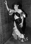 Female impersonator wearing a Latin dancer costume. thumbnail