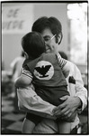 UFW supporter with son thumbnail